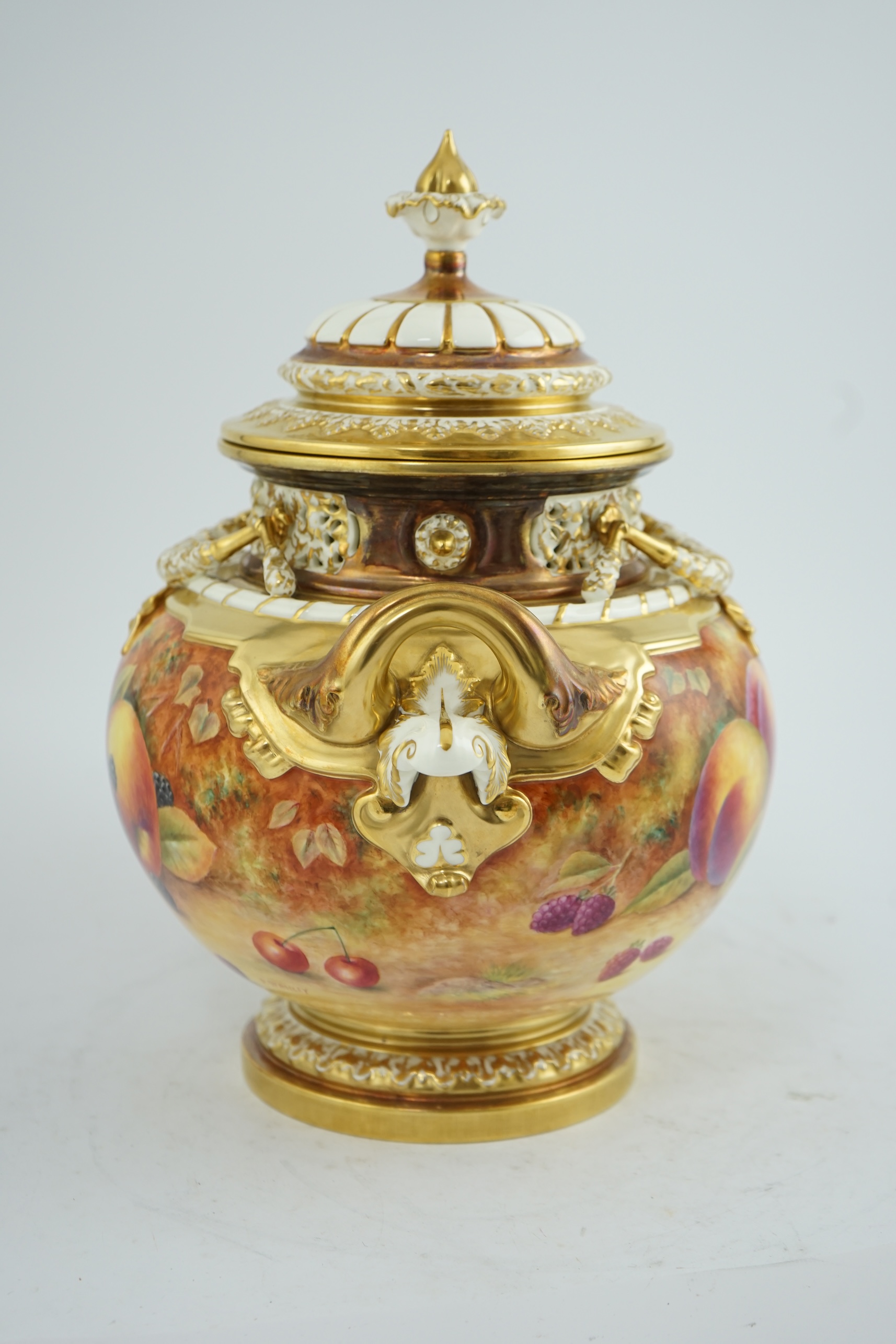 An impressive Royal Worcester fruit painted pot pourri vase and cover, by P. Stanley, post war